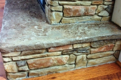 Stone-Edge-Surfaces-decorative-concrete-overlay-fireplace-and-hearth-mountain-dry-stack-fireplace