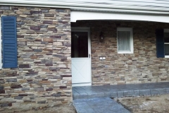 Stone-Edge-Surfaces-decorative-concrete-overlay-home-facade-stamped-stone-front-wall