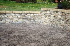 Stone-Edge-Surfaces-decorative-concrete-overlay-patio-and-retaining-wall-stampedconcrete_jpg_w560h420