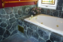 Stone-Edge-Surfaces-decorative-concrete-overlay-tub-surround-and-wall-Brownstone6
